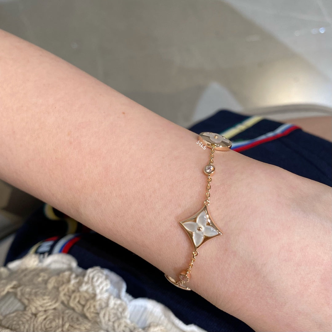 [⭐Maelin]STAR AND SUN 4 MOTIF WHITE MOP PINK GOLD BRACELET
